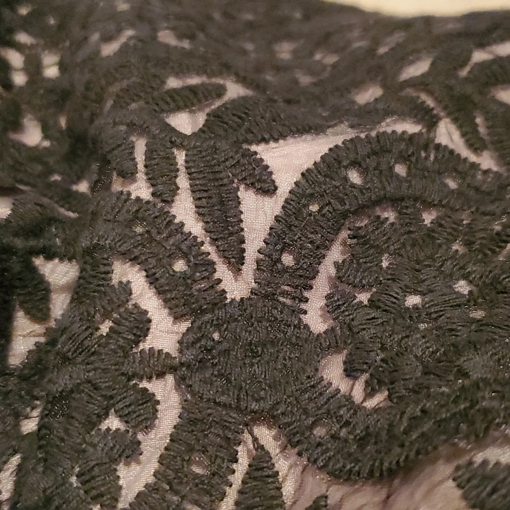 Soprano black with cream underlayer size small in like NEW condition
